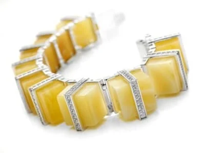NAC Amber: bursztyn naturalny, białe złoto, diamenty