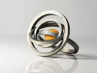 Andrzej Kupniewski: pierścionek - bursztyn bałtycki, srebro